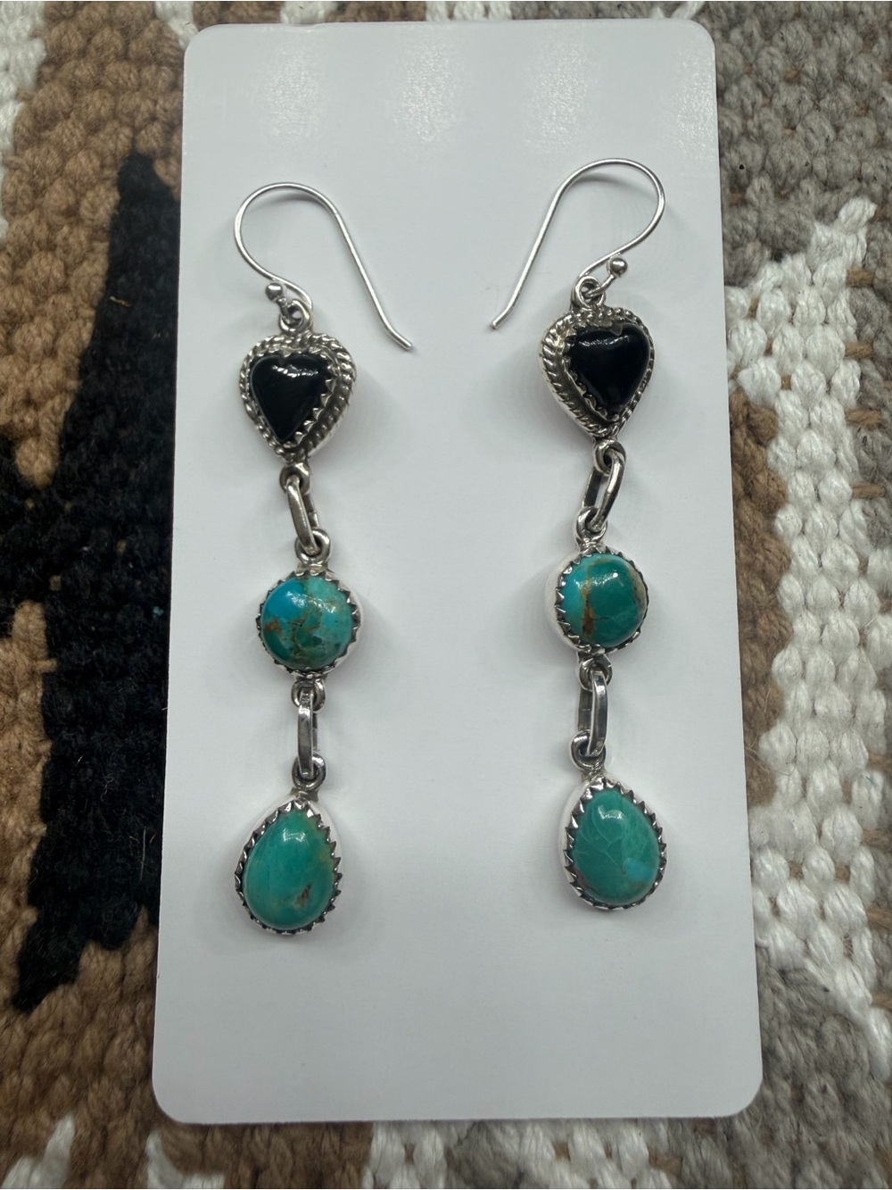 Mohave turquoise with black onyx heart dangle earrings sterling silver